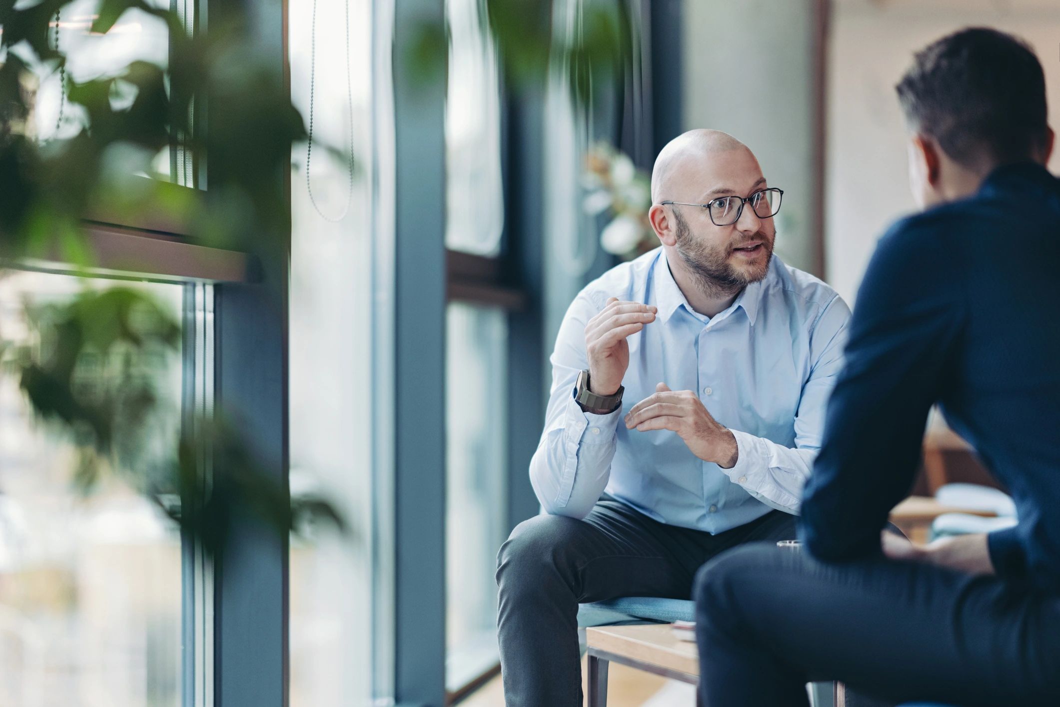 Business professionals discussing a strategy in an office